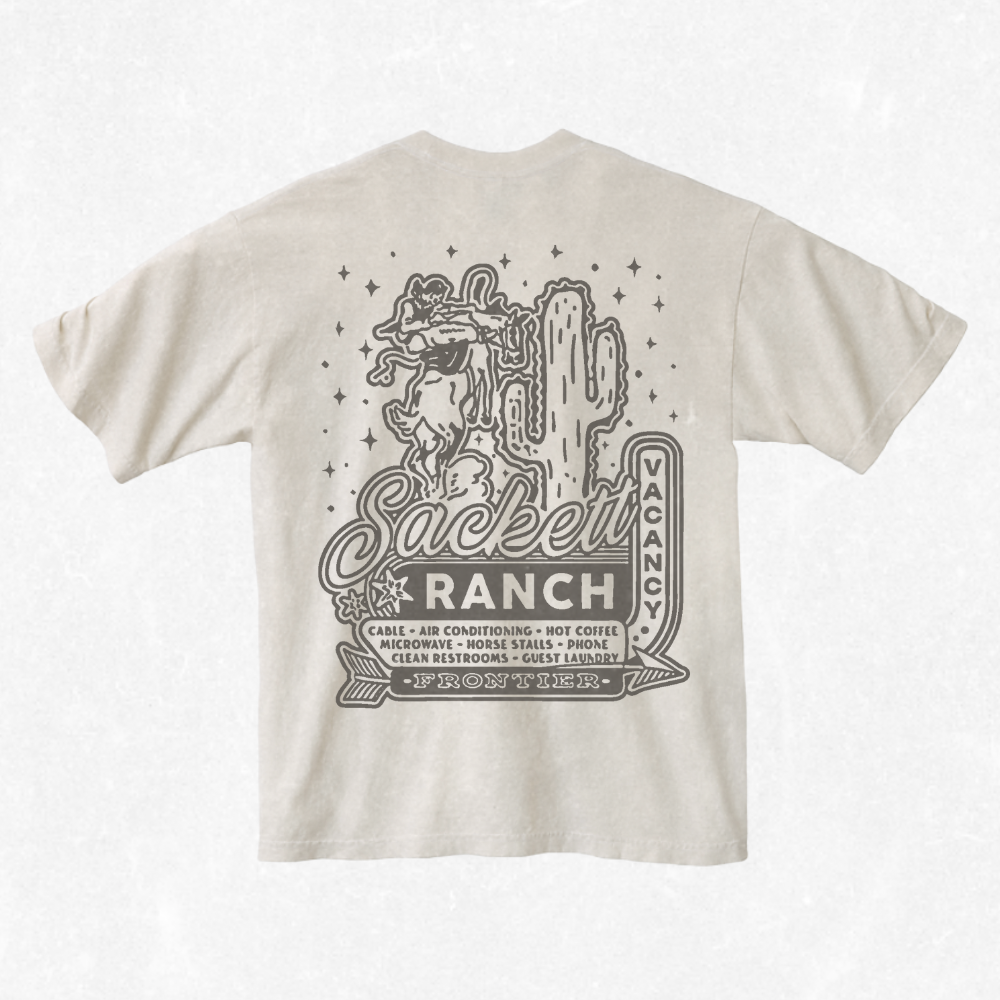 Beige t-shirt with graphic design on the back featuring text and a cactus illustration.