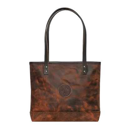 Brown leather tote bag with black handles on a white background