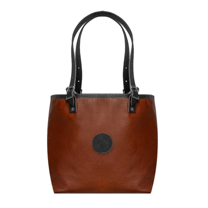 Brown leather tote bag with black straps on a white background
